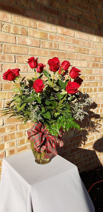 1 doz red roses holiday greens